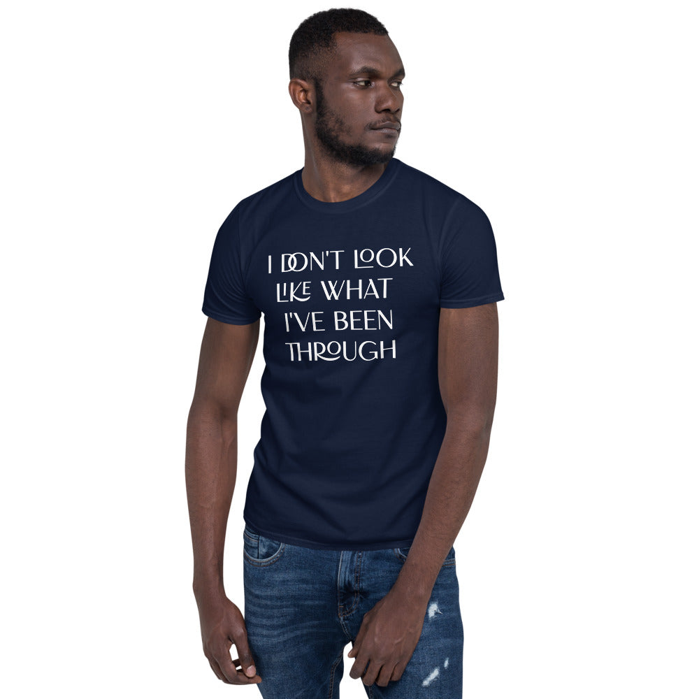 Unisex soft-style Navy T-shirt with I DON'T LOOK LIKE WHAT I'VE BEEN THROUGH in White letters