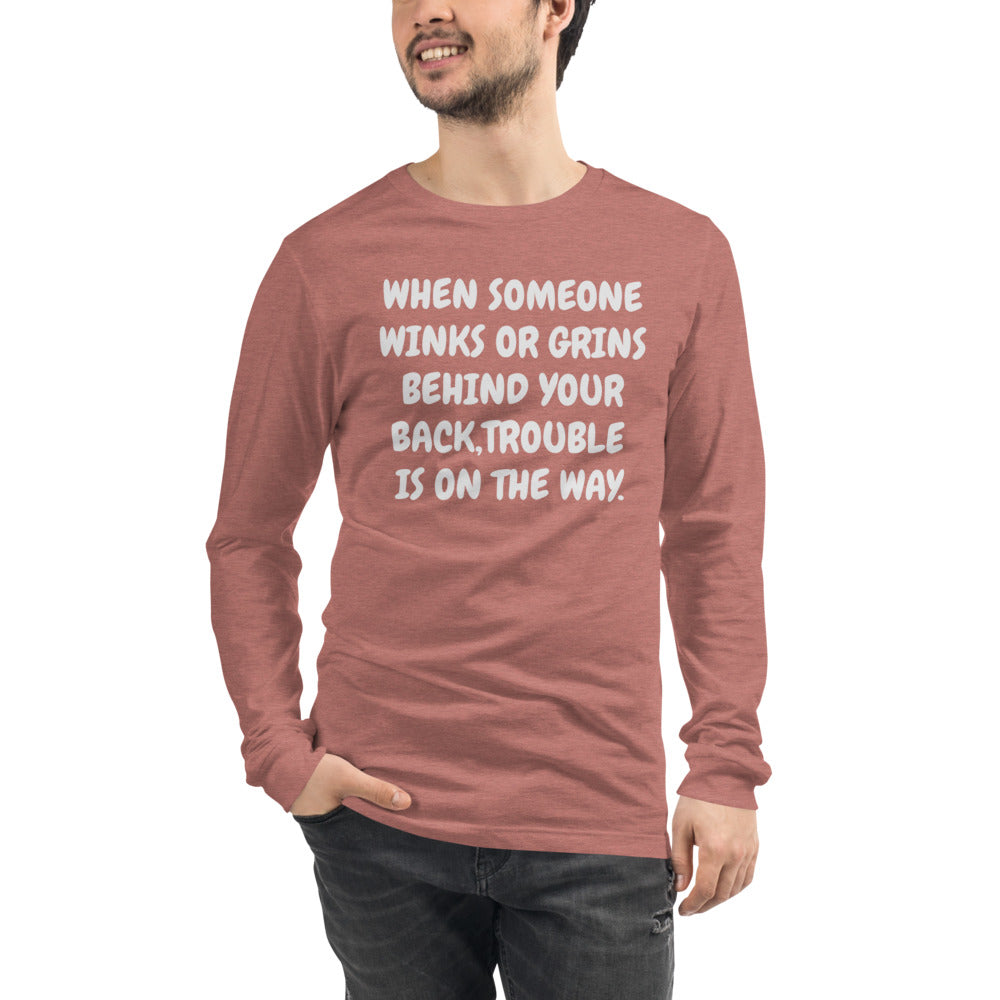 Unisex Mauve Tee with, When someone winks or grins behind your back, trouble is on the way in White letters