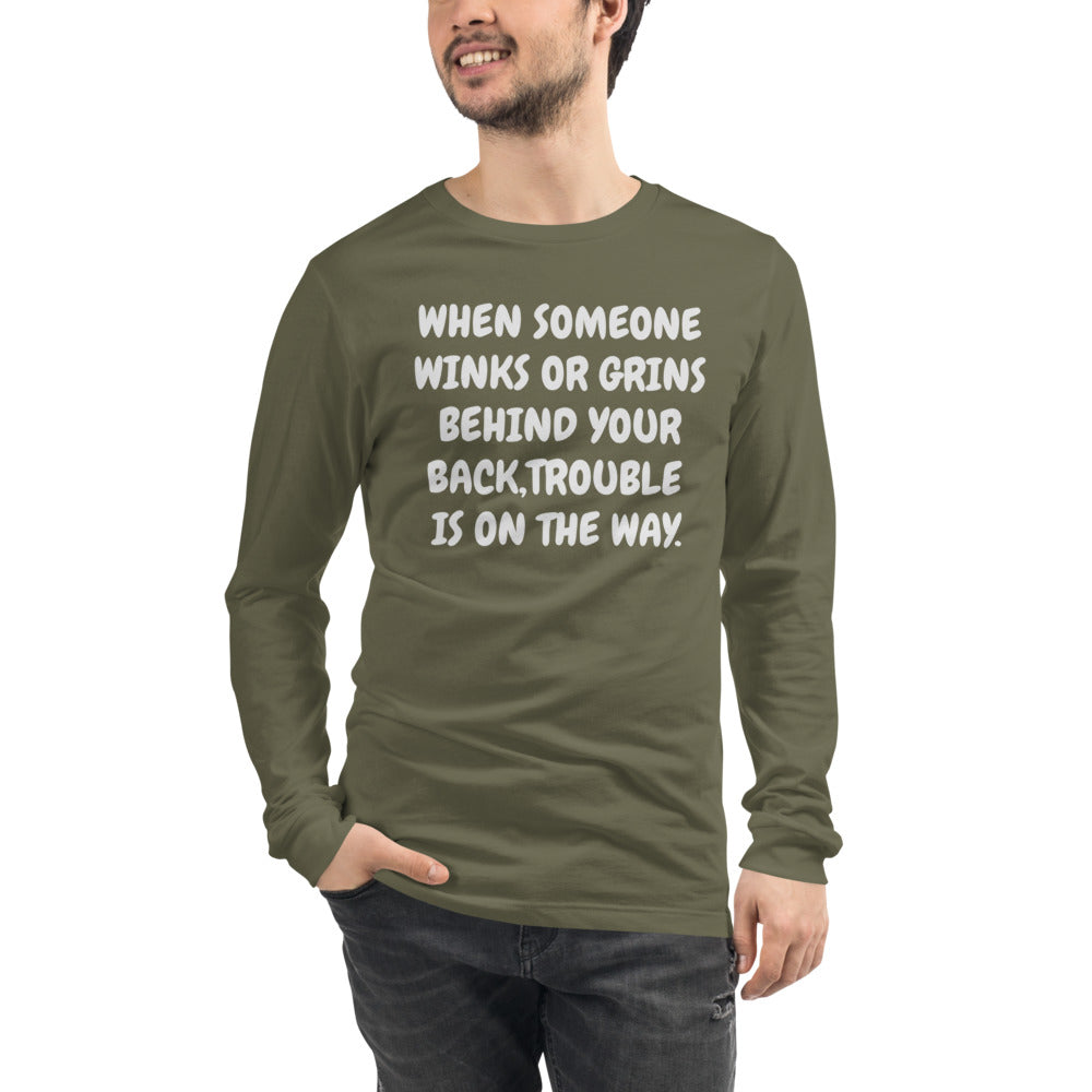 Unisex Green Tee with, When someone winks or grins behind your back trouble , trouble is on the way in White letters