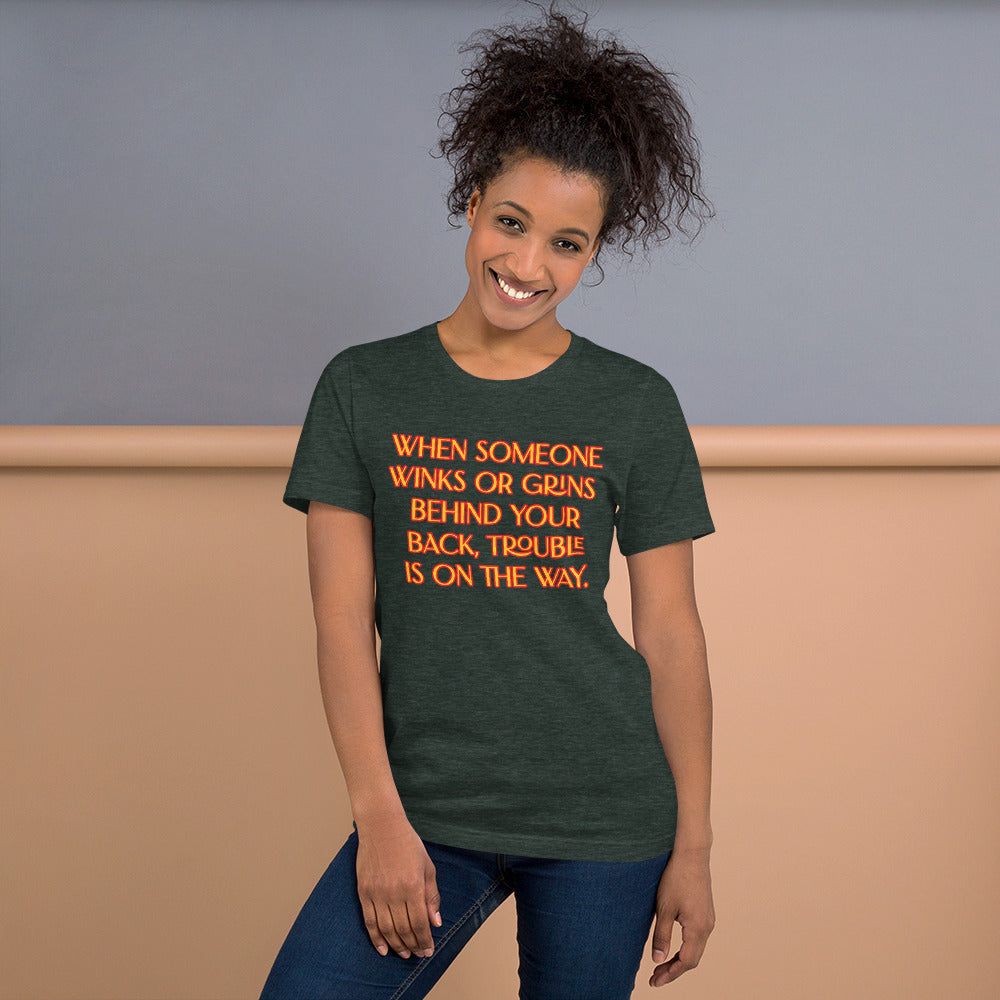 When Someone Winks or Grins Unisex Staple T-Shirt