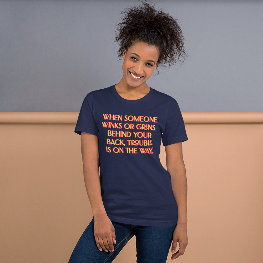 When Someone Winks or Grins Unisex Staple T-Shirt