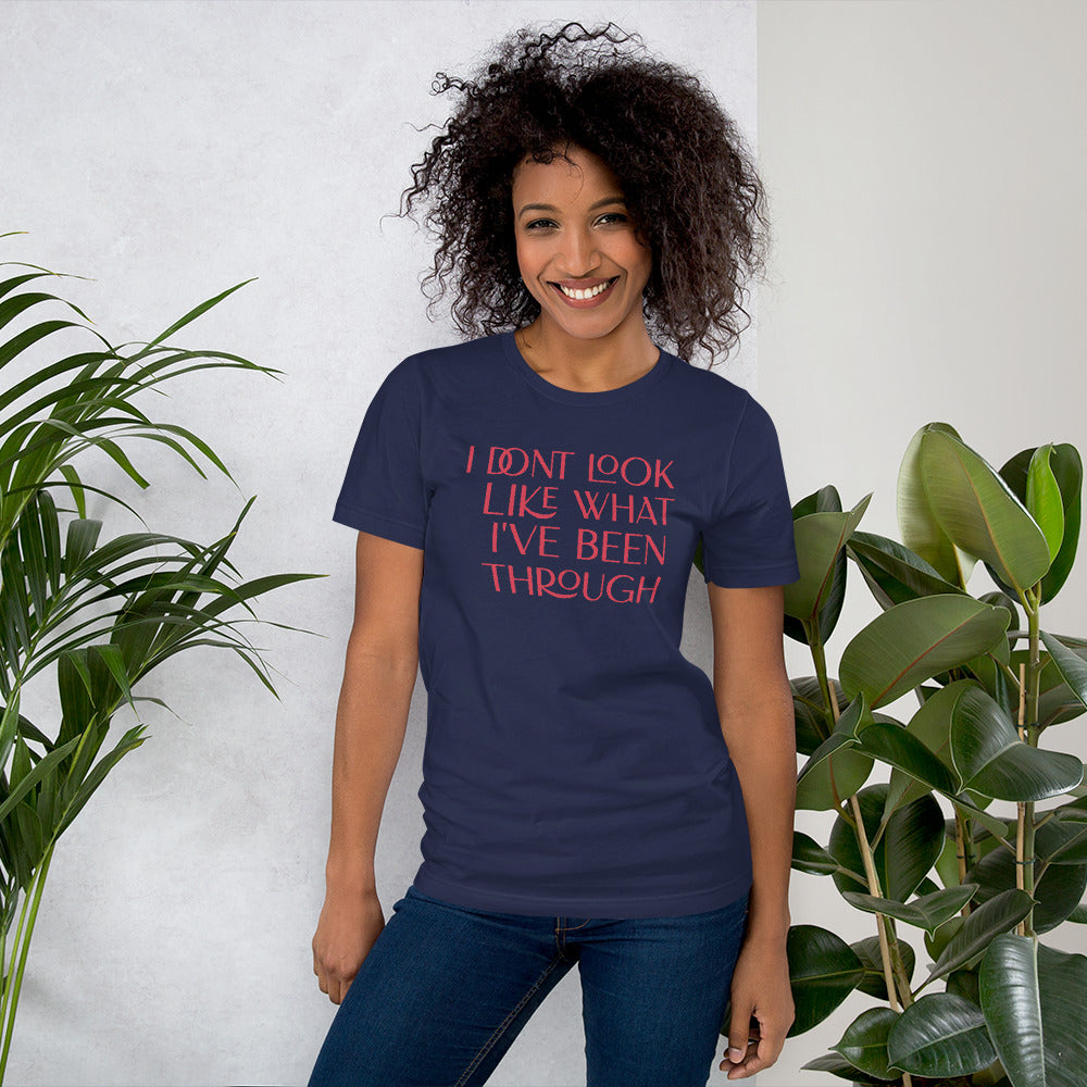I Don't Look Like What I've Unisex Staple T-Shirt