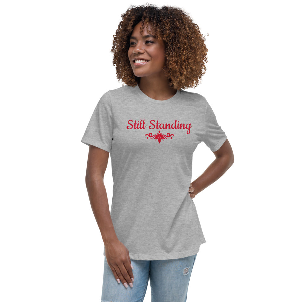 Women's relaxed athletic heather t-shirt with STILL STANDING and a symbol in RED letters