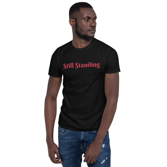 Unisex soft-style black t-shirt with STILL STANDING in Red letters
