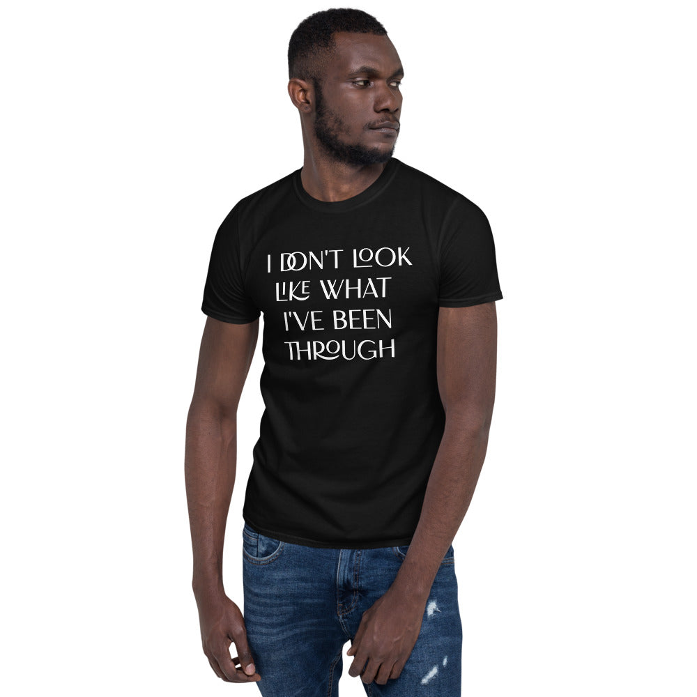 Unisex soft-style black t-shirt with I DON'T LOOK LIKE WHAT I'VE BEEN THROUGH in White letters