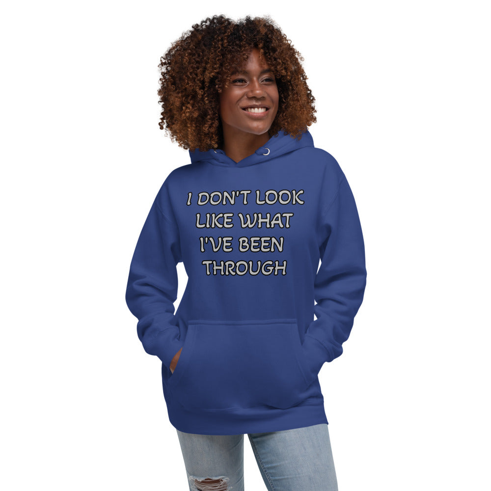 Royal Blue Hoodie with I don't look like what I've been through in White letters outlined in Black