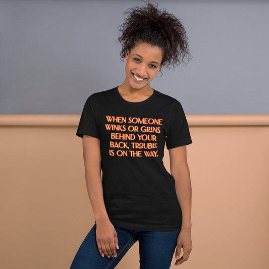 When Someone Winks or Grins Unisex Staple T-Shirt