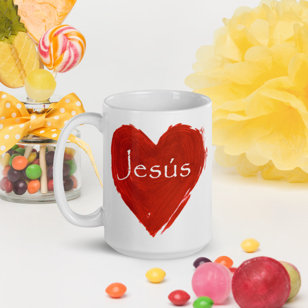 White 15oz mug with a red heart and Jesus' name written in white on the outside of the mug