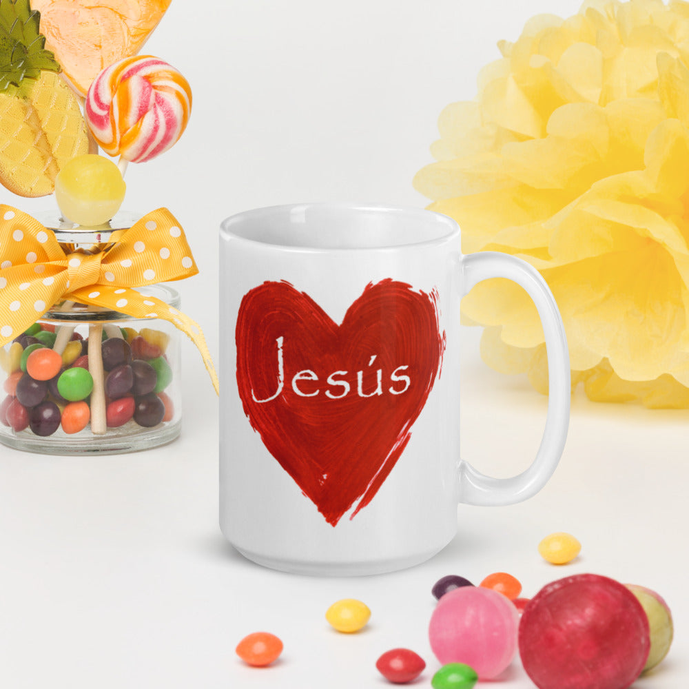 White 15oz. mug with a red heart and Jesus' name on the outside of the mug written in White